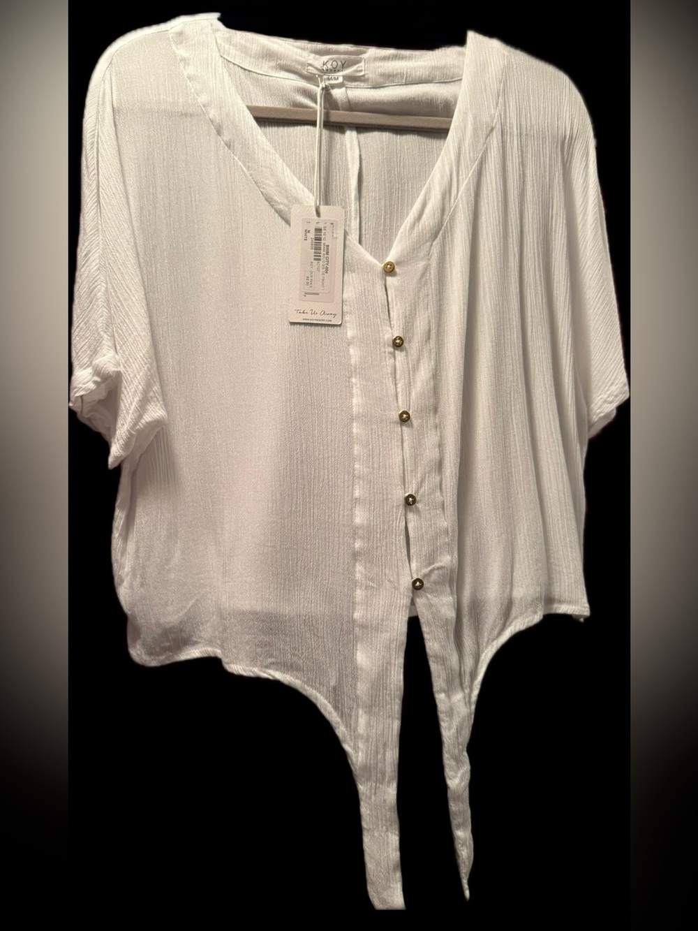 Koy Resort, Miami Tie Front. V-neckline, short sleeves, front button & tied hem.